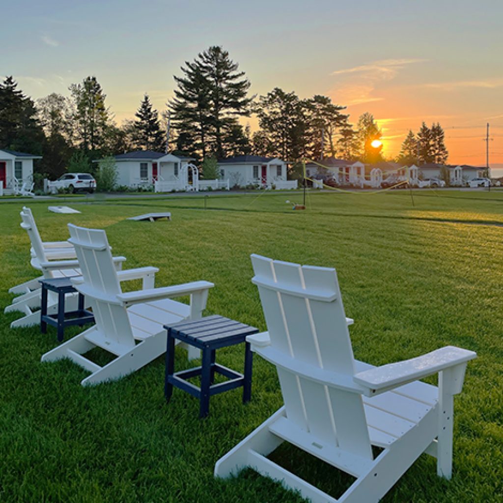 sun rising over Salt Cottages lawn
